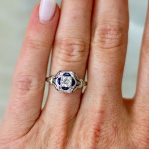 Art deco diamond engagement ring with half moon sapphires in 18k white gold